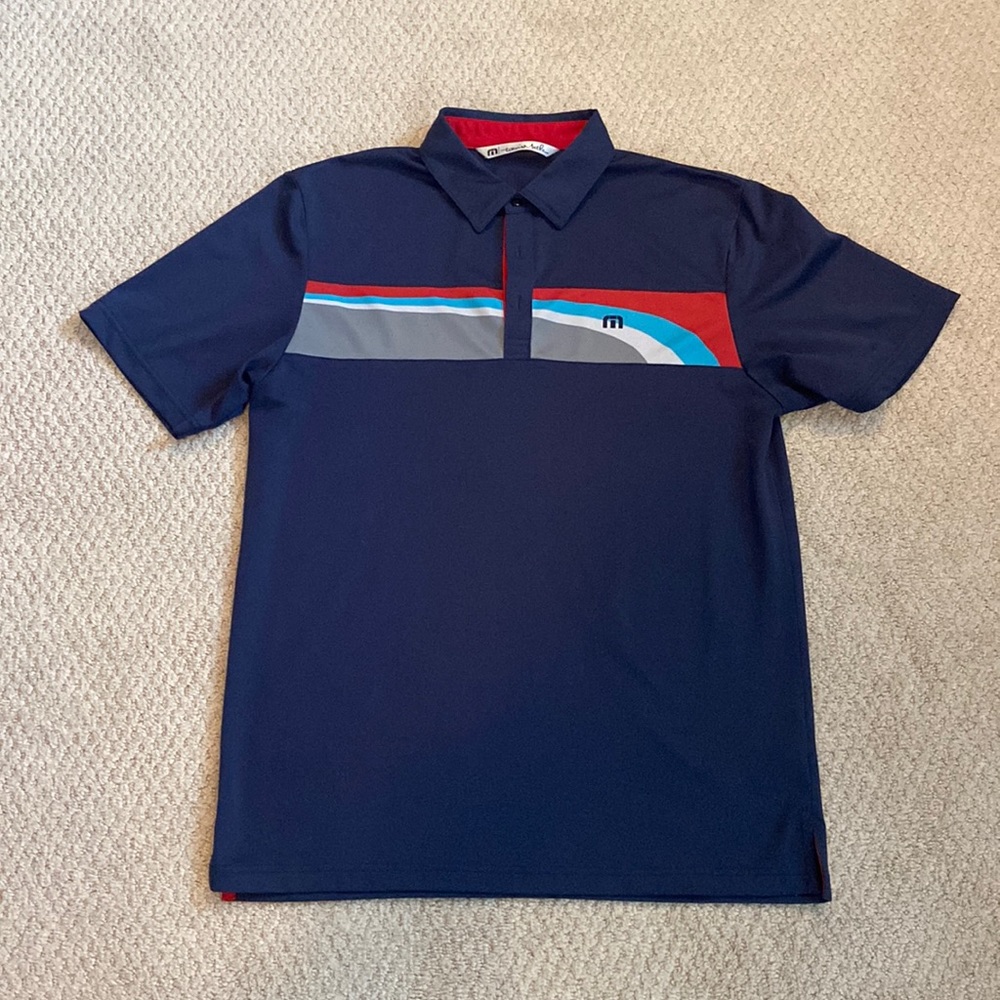 Travis Mathew blue golf polo.  Size M. Excellent condition.